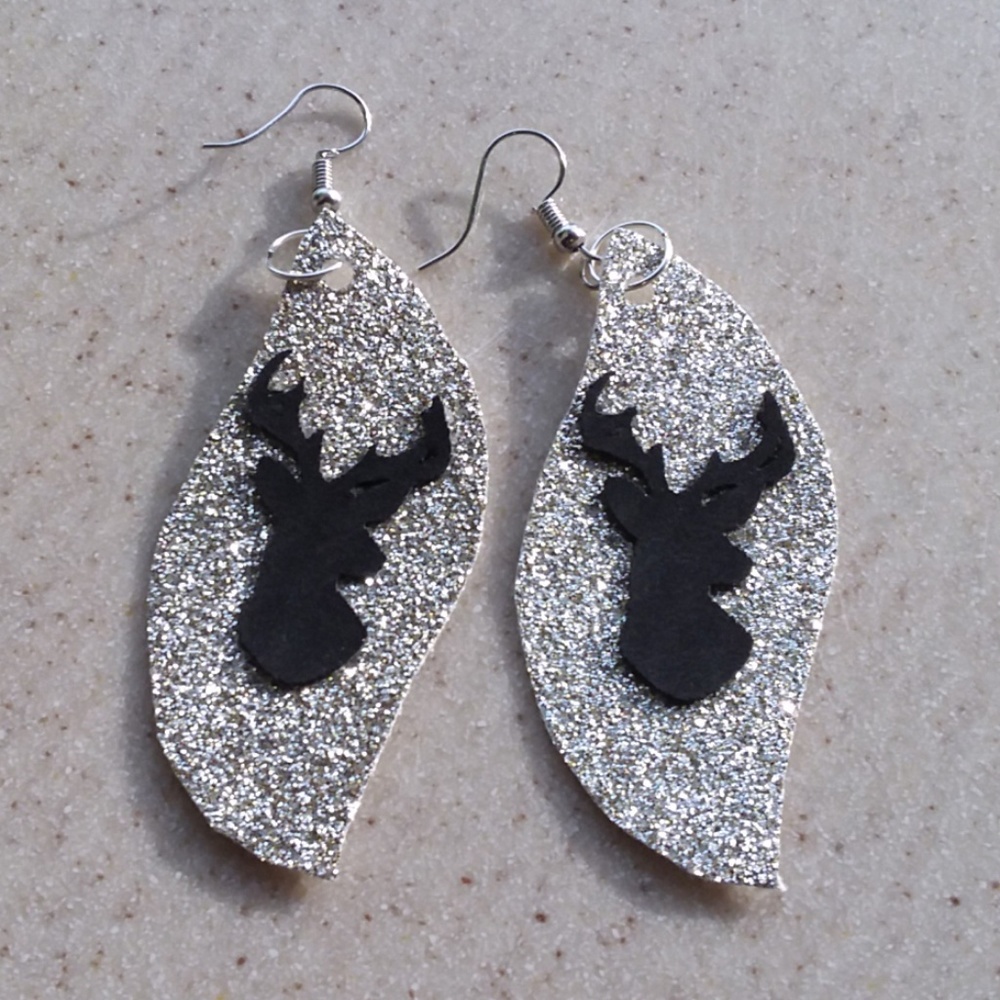 Large, silver sparkle dangle earrings with deer